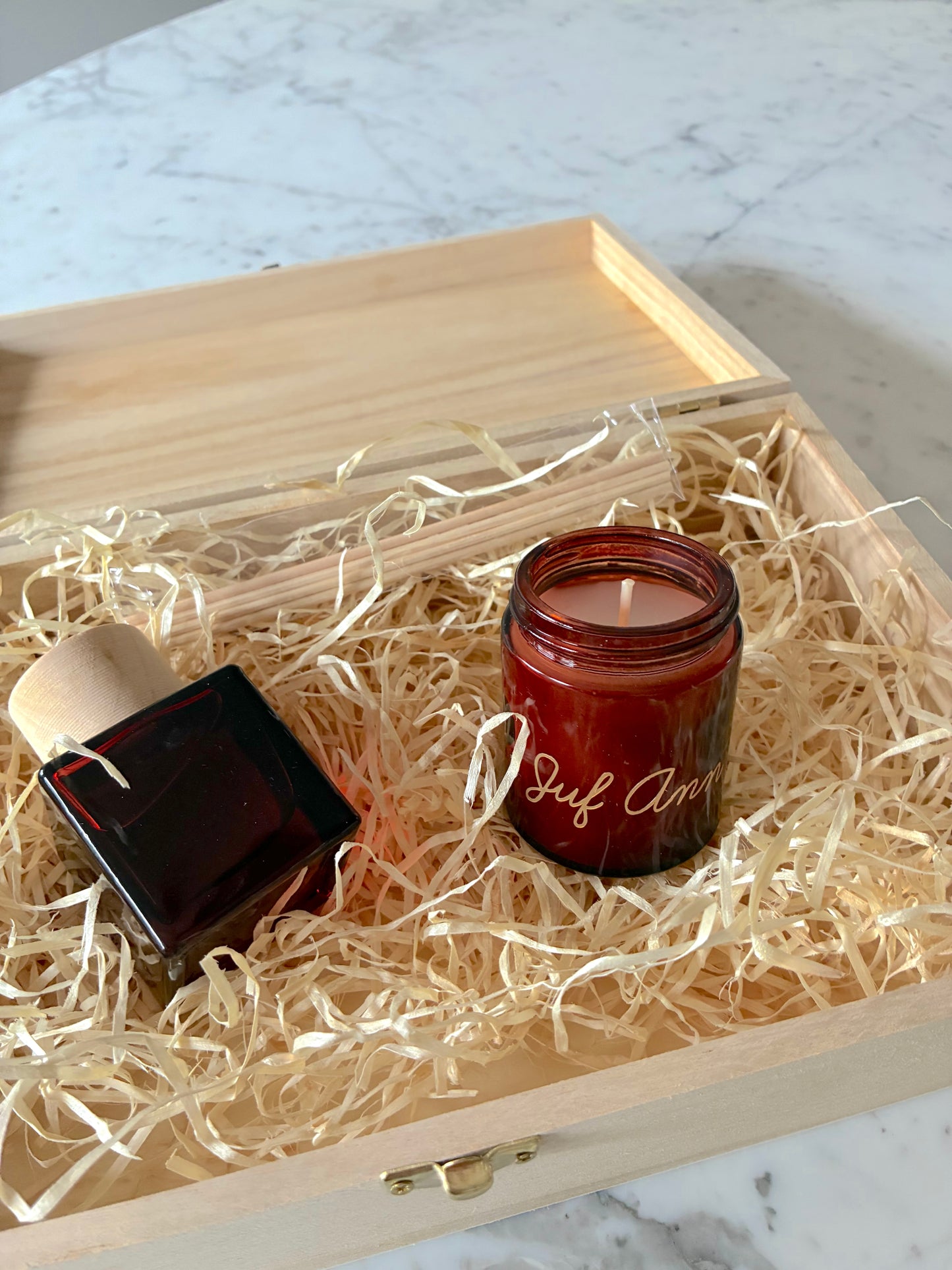 Geschenkdoos met huisparfum en geurkaars
